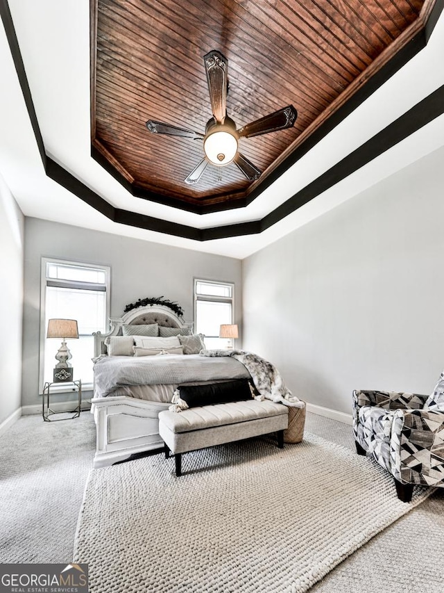 1141 Addington Ln, Waleska, GA 30183 - carpeted bedroom featuring ceiling fan, baseboards, a raised ceiling, and wood ceiling