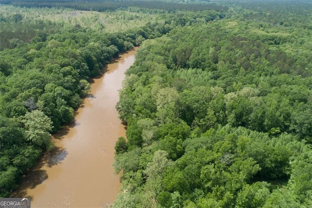 aerial view featuring a view of trees