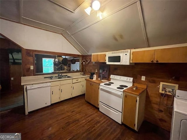kitchen with dark wood-style floors, light countertops, and white appliances