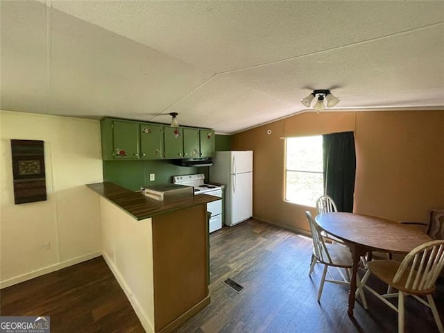 kitchen featuring under cabinet range hood, green cabinets, a peninsula, white appliances, and dark wood finished floors