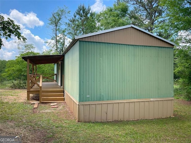 view of home's exterior with a yard