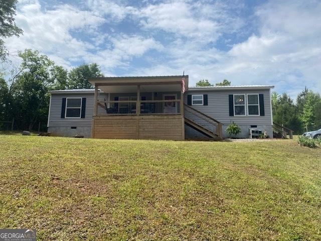 196 SE Stembridge Rd SE, Milledgeville, GA 31061 - view of front of property with stairway, crawl space, and a front lawn