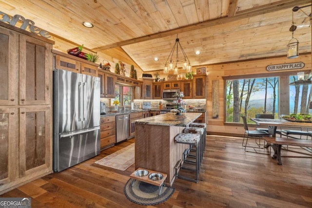 194 Blue Sky Overlook, Blue Ridge, GA 30513 - kitchen with wood ceiling, brown cabinets, glass insert cabinets, appliances with stainless steel finishes, and vaulted ceiling with beams