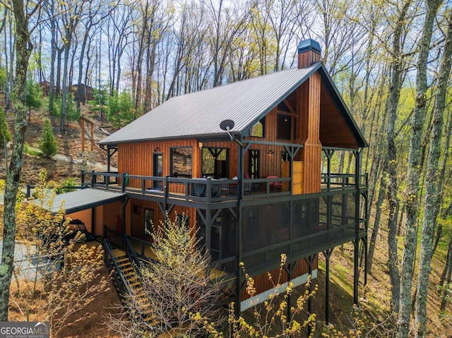 283 Blue Sky Overlook, Blue Ridge, GA 30513 - back of property with metal roof, a deck, and a chimney