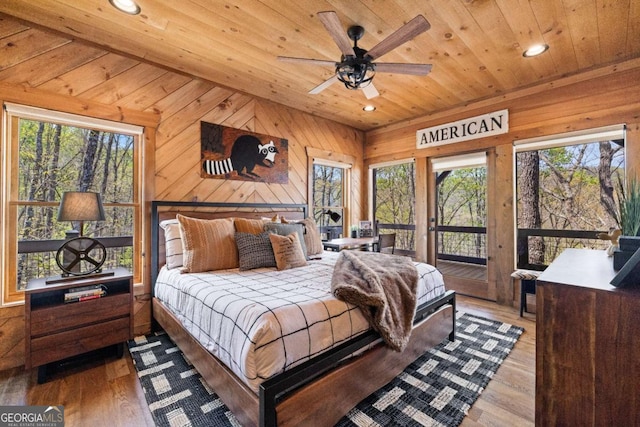 283 Blue Sky Overlook, Blue Ridge, GA 30513 - bedroom with wooden ceiling, wood walls, multiple windows, and recessed lighting