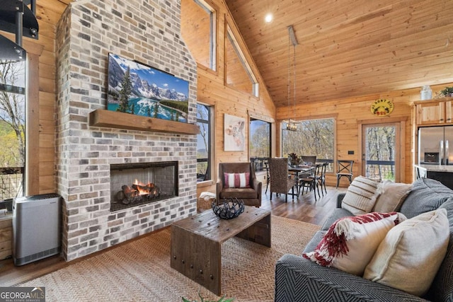 283 Blue Sky Overlook, Blue Ridge, GA 30513 - living area featuring wooden walls, wood finished floors, high vaulted ceiling, and wooden ceiling
