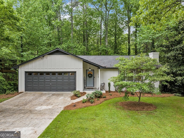 property entrance featuring a garage, a shingled roof, board and batten siding, and a chimney