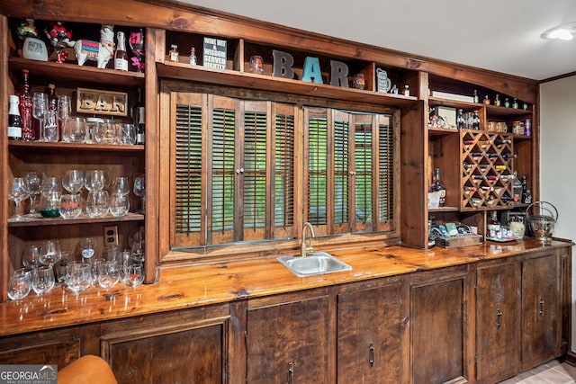 bar with a sink and wet bar