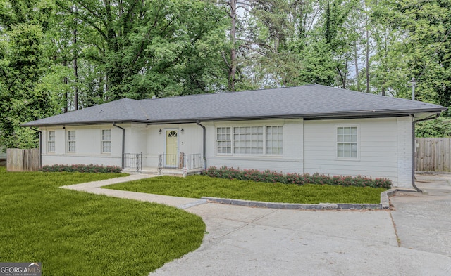 2174 Beecher Rd SW, Atlanta, GA 30311 - single story home with brick siding, roof with shingles, a front lawn, and fence