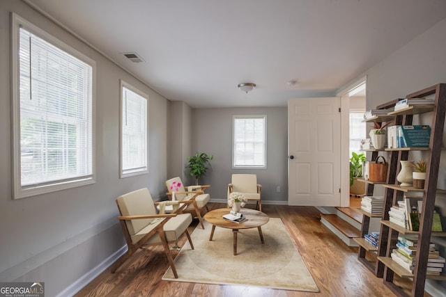 2174 Beecher Rd SW, Atlanta, GA 30311 - sitting room featuring baseboards, visible vents, and wood finished floors