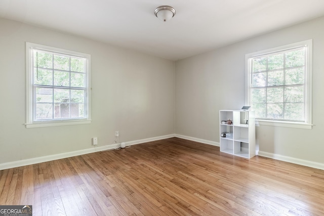 2174 Beecher Rd SW, Atlanta, GA 30311 - unfurnished room with light wood finished floors and baseboards