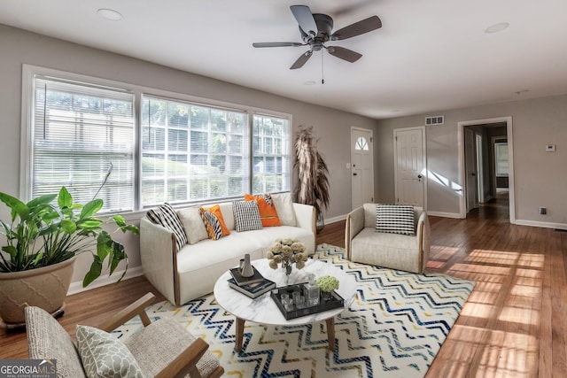 2174 Beecher Rd SW, Atlanta, GA 30311 - living room with wood finished floors, a ceiling fan, visible vents, baseboards, and recessed lighting