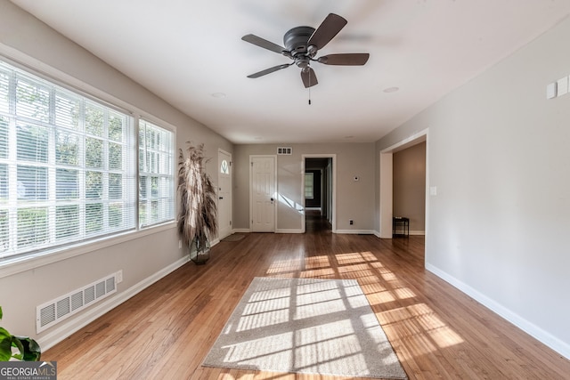 2174 Beecher Rd SW, Atlanta, GA 30311 - spare room featuring ceiling fan, baseboards, visible vents, and wood finished floors