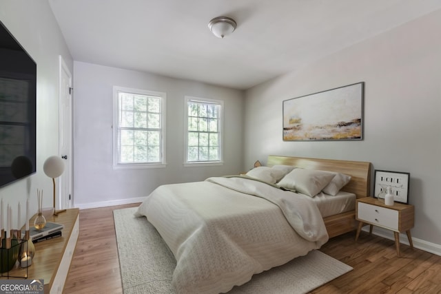 2174 Beecher Rd SW, Atlanta, GA 30311 - bedroom featuring light wood-style floors and baseboards