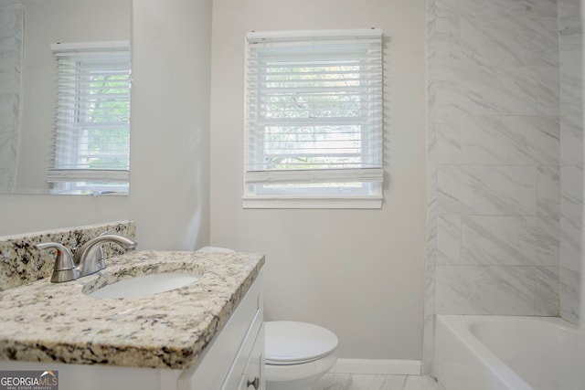 full bath with baseboards, toilet, vanity, and marble finish floor