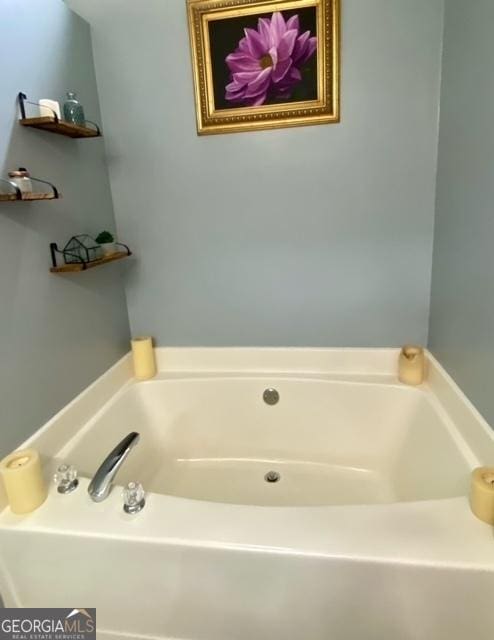 full bathroom featuring a garden tub