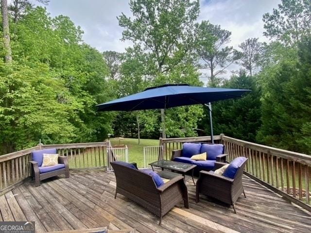 wooden deck with an outdoor hangout area