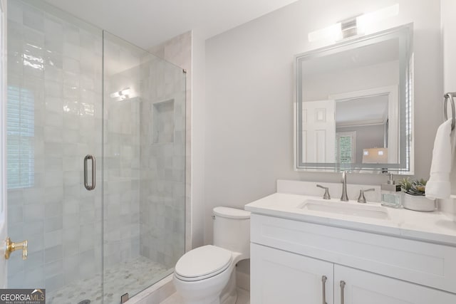 945 Hampton Bluff Dr, Milton, GA 30004 - bathroom featuring vanity, toilet, and a shower stall