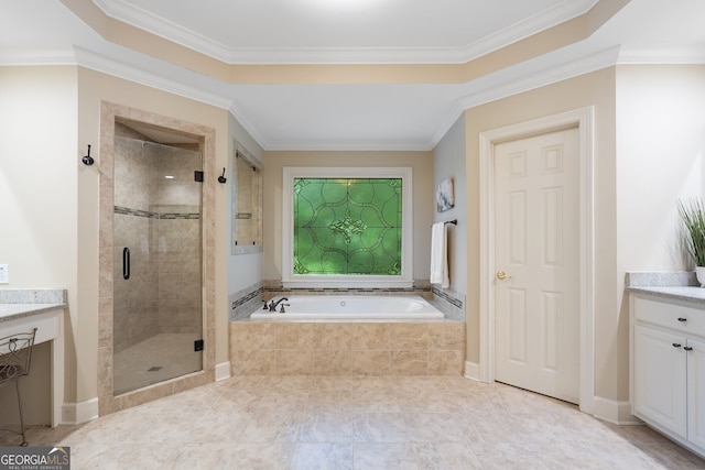 945 Hampton Bluff Dr, Milton, GA 30004 - bathroom with vanity, ornamental molding, a garden tub, and a stall shower