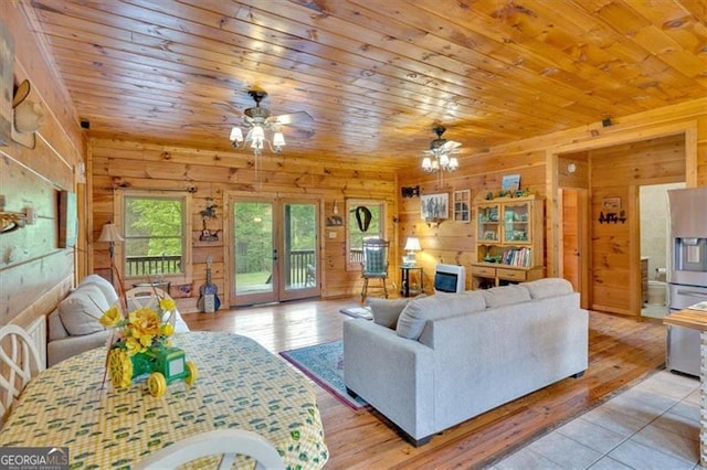 2791 Back Valley Rd, Lyerly, GA 30730 - living area featuring wooden walls, wood ceiling, and a ceiling fan