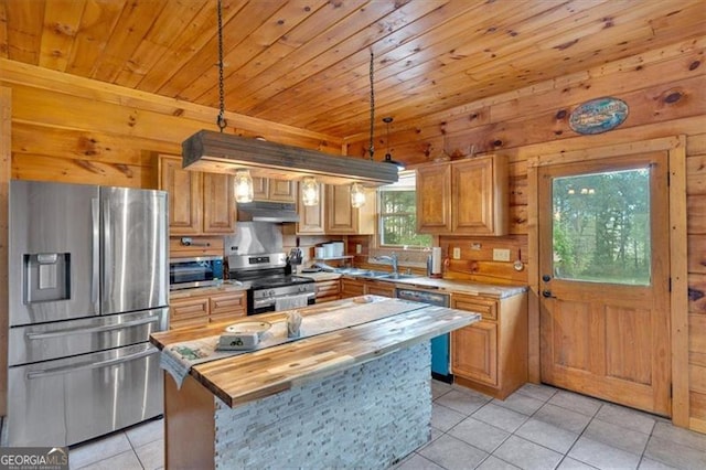 2791 Back Valley Rd, Lyerly, GA 30730 - kitchen featuring appliances with stainless steel finishes, butcher block countertops, wooden ceiling, light tile patterned floors, and under cabinet range hood
