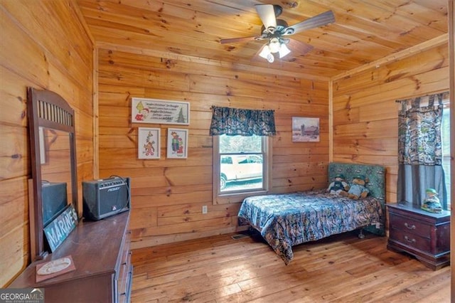 2791 Back Valley Rd, Lyerly, GA 30730 - bedroom with wooden walls, wood ceiling, a ceiling fan, and hardwood / wood-style flooring