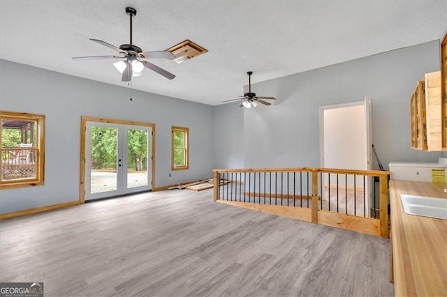 2791 Back Valley Rd, Lyerly, GA 30730 - interior space with french doors, a ceiling fan, wood finished floors, a sink, and baseboards