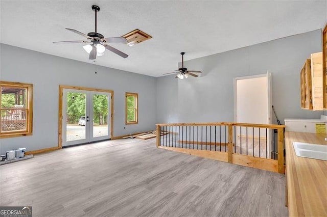 2791 Back Valley Rd, Lyerly, GA 30730 - interior space with french doors, a ceiling fan, wood finished floors, and a sink