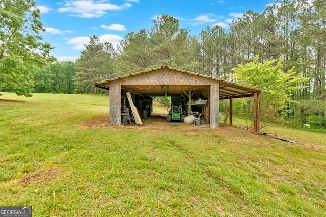 2791 Back Valley Rd, Lyerly, GA 30730 - view of pole building featuring a carport and a yard