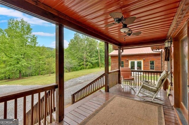 2791 Back Valley Rd, Lyerly, GA 30730 - deck featuring a ceiling fan, french doors, and a yard