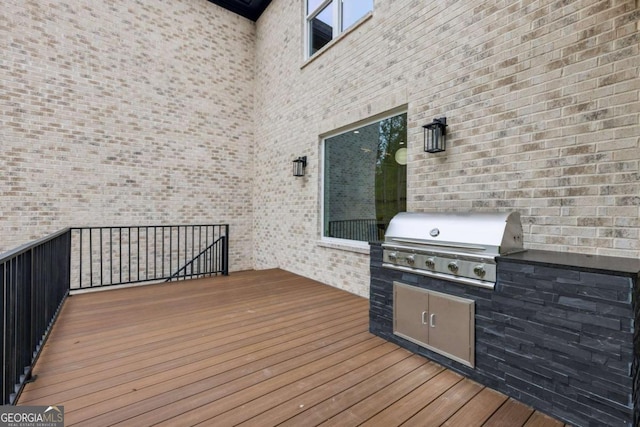 1255 E M Croy Rd, Sugar Hill, GA 30518 - wooden terrace with area for grilling