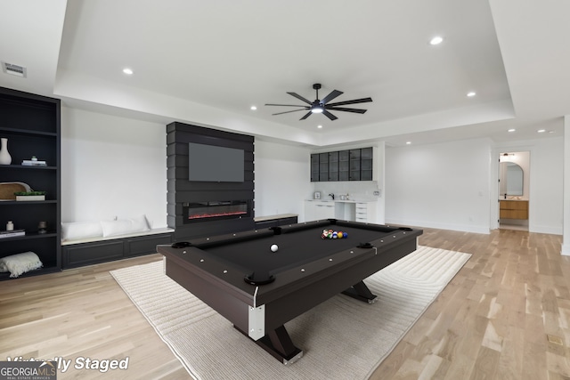 1255 E M Croy Rd, Sugar Hill, GA 30518 - playroom with a tray ceiling, a ceiling fan, light wood-type flooring, pool table, and a fireplace