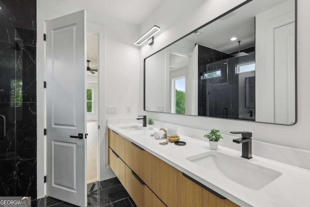 1255 E M Croy Rd, Sugar Hill, GA 30518 - bathroom featuring a marble finish shower, double vanity, and recessed lighting