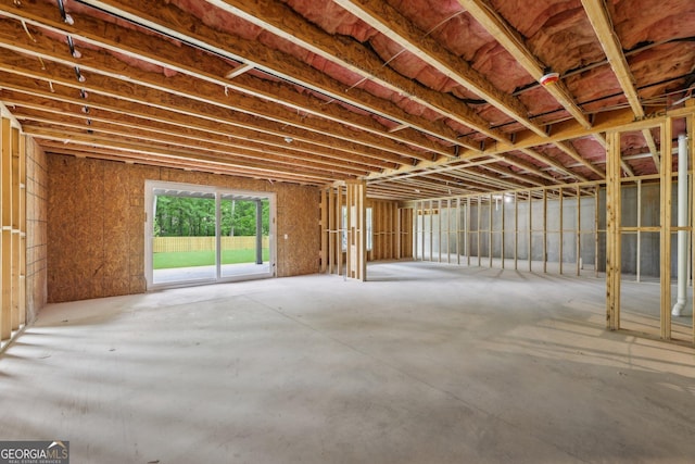 1255 E M Croy Rd, Sugar Hill, GA 30518 - miscellaneous room with unfinished concrete floors