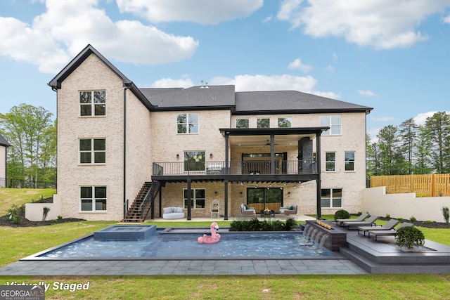 1255 E M Croy Rd, Sugar Hill, GA 30518 - back of property with stairway, an outdoor living space, a deck, a patio area, and a pool with connected hot tub
