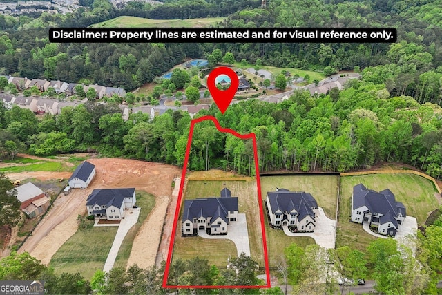 1255 E M Croy Rd, Sugar Hill, GA 30518 - aerial perspective of suburban area featuring property boundaries highlighted and a heavily wooded area