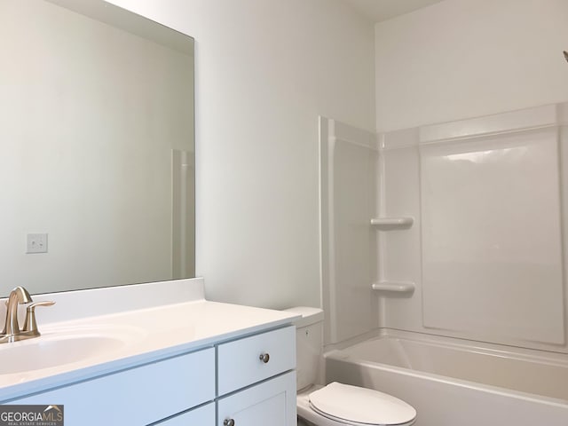 full bath with vanity, toilet, and tub / shower combination