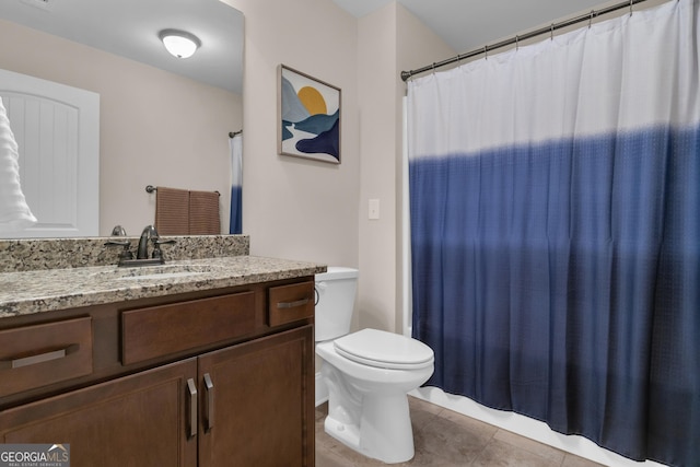 full bath with vanity, tile patterned flooring, toilet, and curtained shower