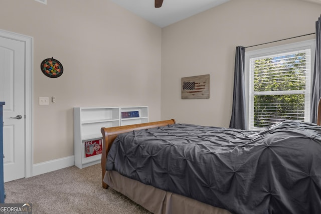 bedroom with baseboards, ceiling fan, and carpet