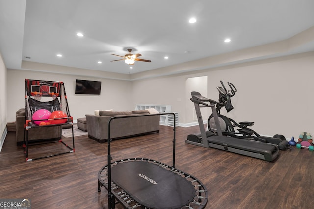 workout area with recessed lighting, baseboards, ceiling fan, and wood finished floors