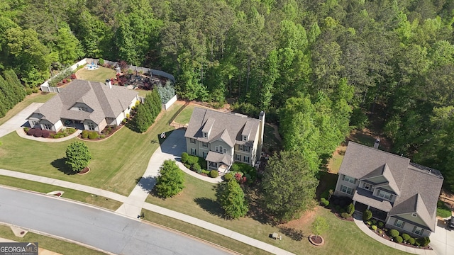 aerial view with a wooded view