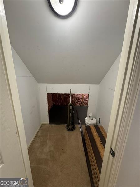 955 Tributary Way, Dacula, GA 30019 - bonus room featuring vaulted ceiling and carpet