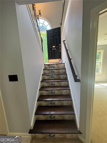 955 Tributary Way, Dacula, GA 30019 - staircase with baseboards and carpet flooring