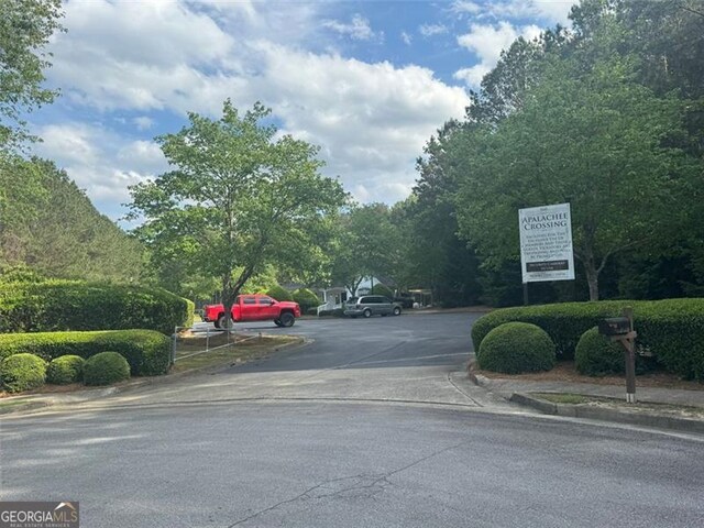 955 Tributary Way, Dacula, GA 30019 - view of asphalt road featuring curbs