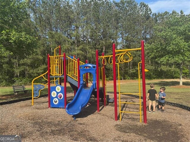 955 Tributary Way, Dacula, GA 30019 - communal playground featuring view of scattered trees