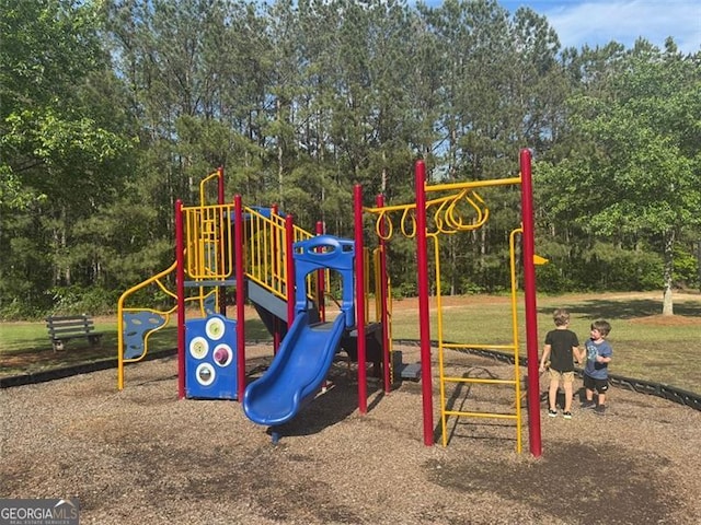 955 Tributary Way, Dacula, GA 30019 - community jungle gym with view of scattered trees