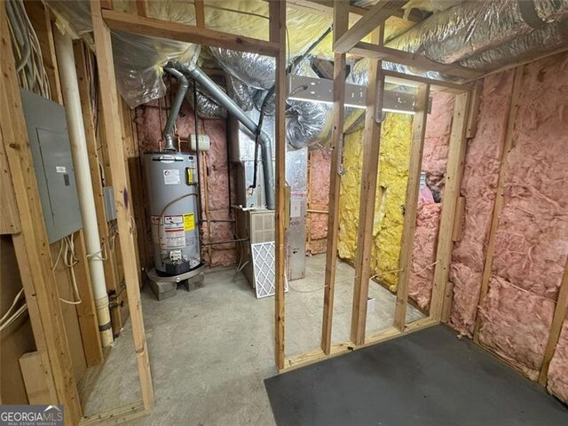 955 Tributary Way, Dacula, GA 30019 - unfinished basement with gas water heater, electric panel, and heating unit