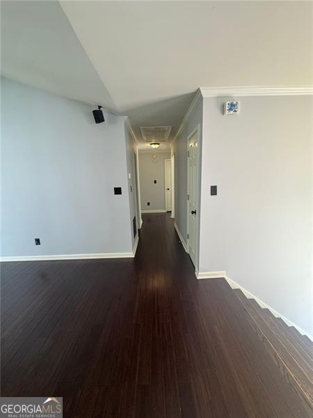 955 Tributary Way, Dacula, GA 30019 - hallway featuring attic access, dark wood finished floors, and baseboards