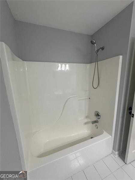 955 Tributary Way, Dacula, GA 30019 - full bath featuring tile patterned floors and shower / bath combination