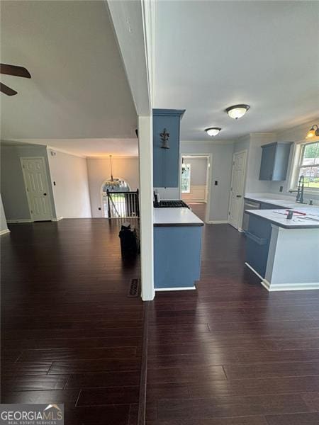 955 Tributary Way, Dacula, GA 30019 - kitchen featuring a ceiling fan, dark wood-style floors, and light countertops
